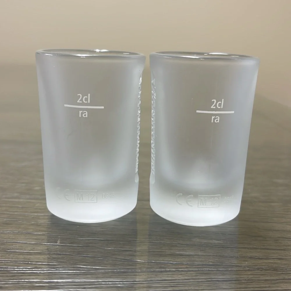Pair of Embossed Jagermeister Frosted Glass 1 fl. oz Shot Glasses Barware Bar